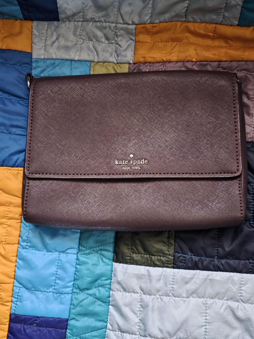 kate spade plum textured crossbody bag with gold logo